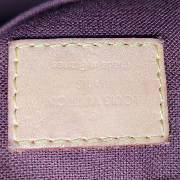 LOUIS VUITTON RIVOLI PM - Picture 13 of 15